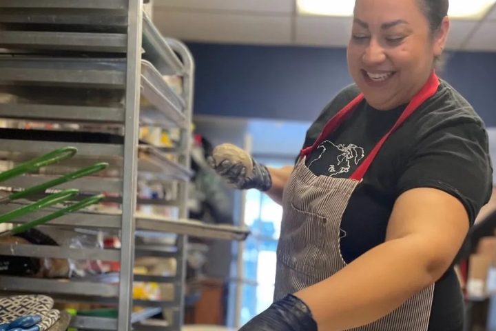 Tawnya Brant cooking in her kitchen