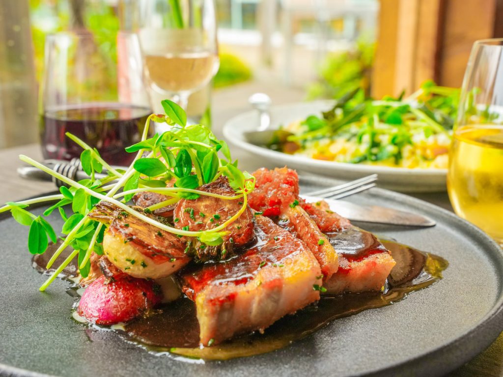 close up of food and wine at the good earth