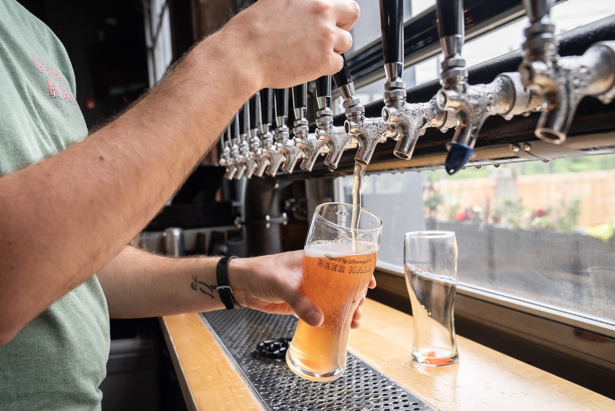 A beer being poured off the tap at Royal City Brewing Co.