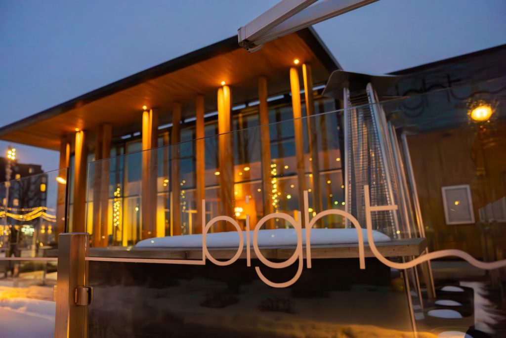 exterior shot of Bight all lit up at night