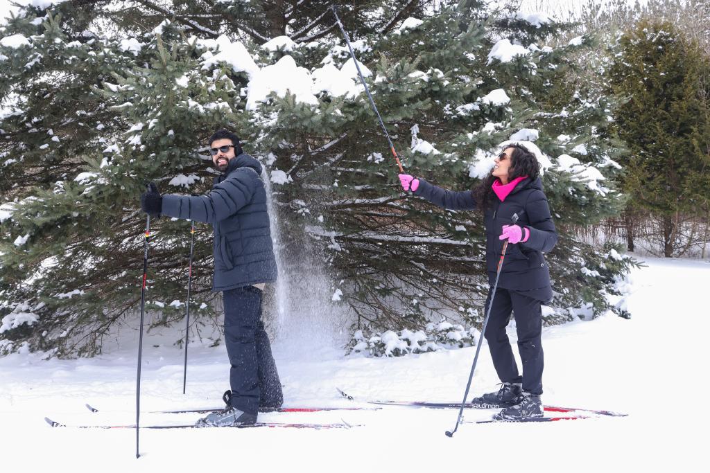 Two people cross country skiing at Albion Hils Conservation Area