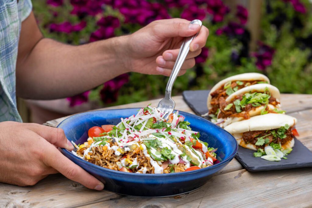 close up of rice bowl and bao buns at Radical Gardens