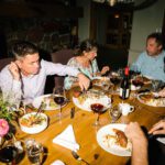 eating food at the dining room at the Elmhirst's Resort